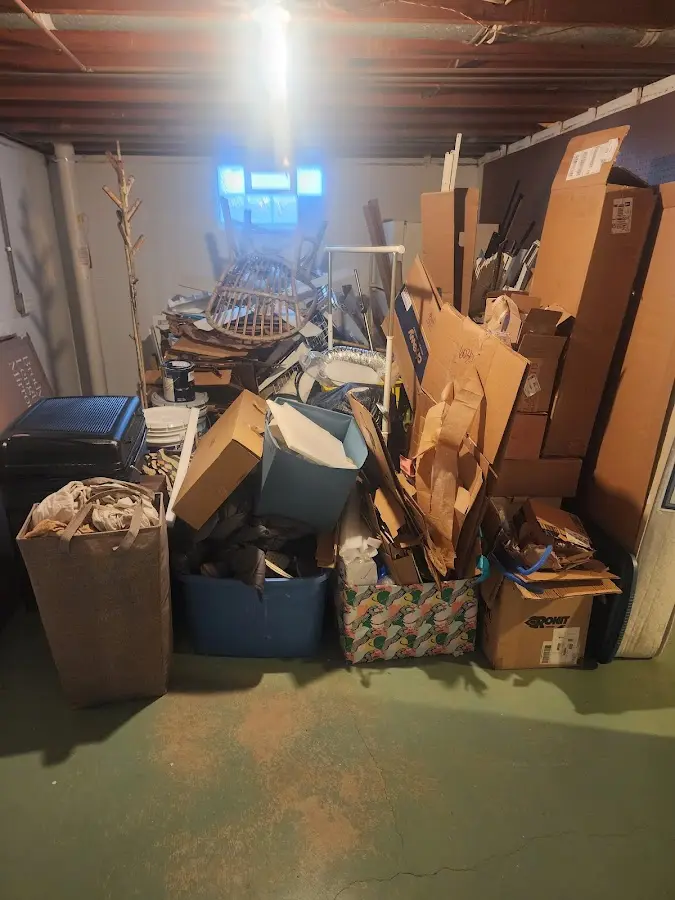 Roll-off dumpster container at job site for Cleanout Dumpster Rental in Fort Morgan